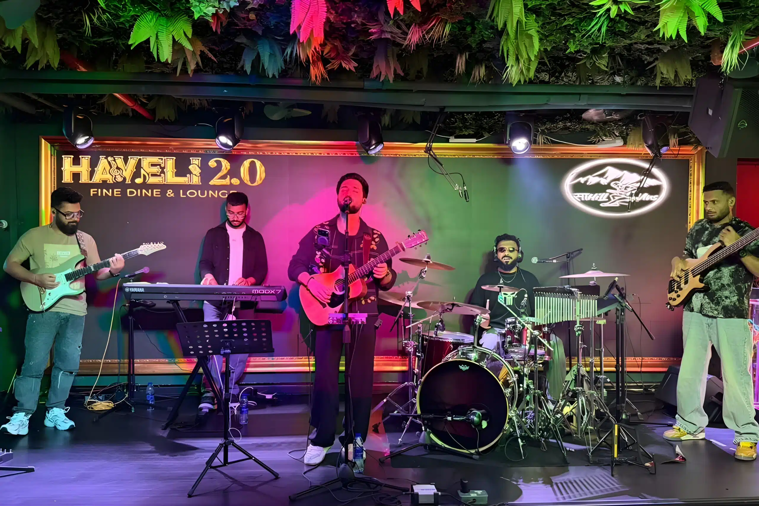 Live music performance and artist signing event at Haveli lounge bar and restaurant.