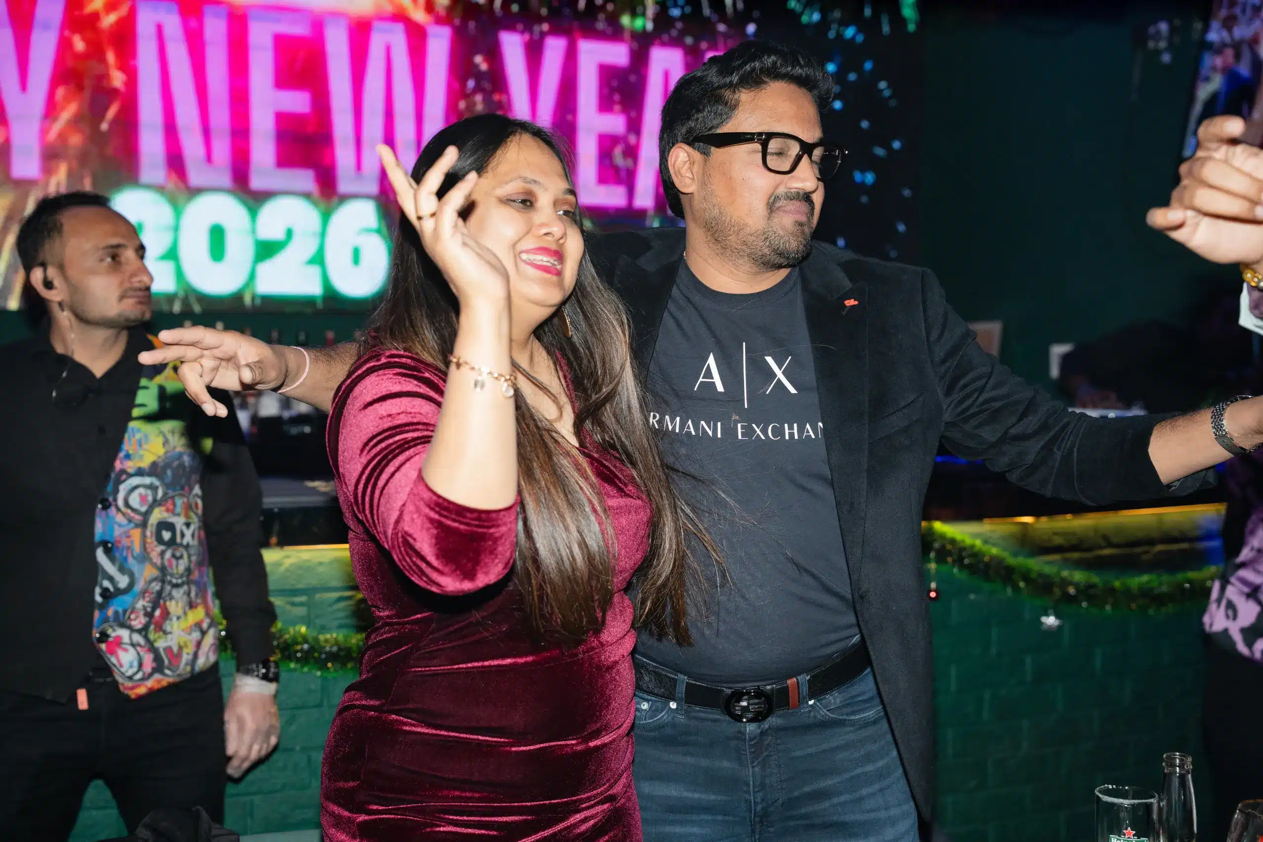 People enjoying food and music in a social setting